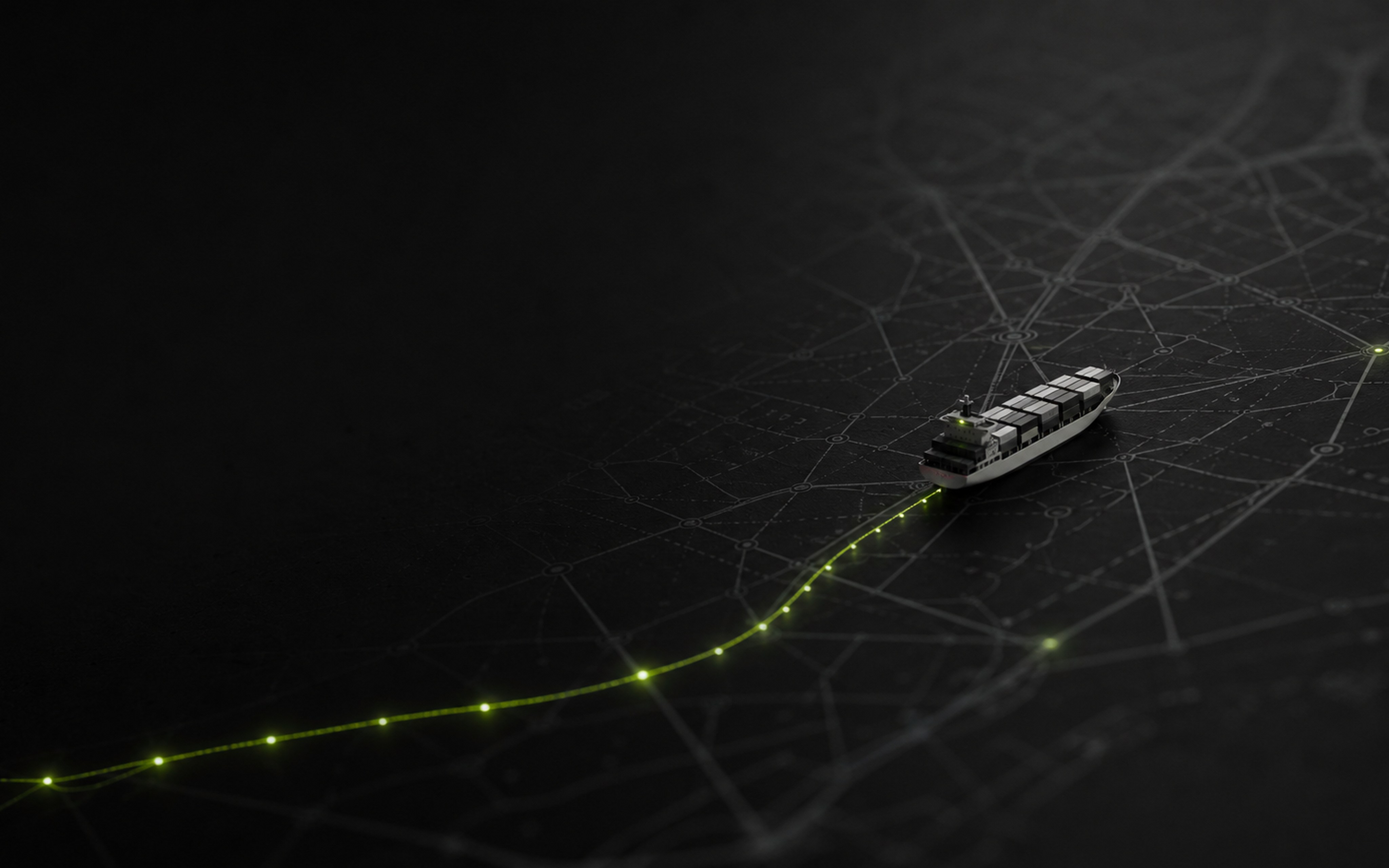 A lone miniature container vessel crossing a dark machined navigation chart.